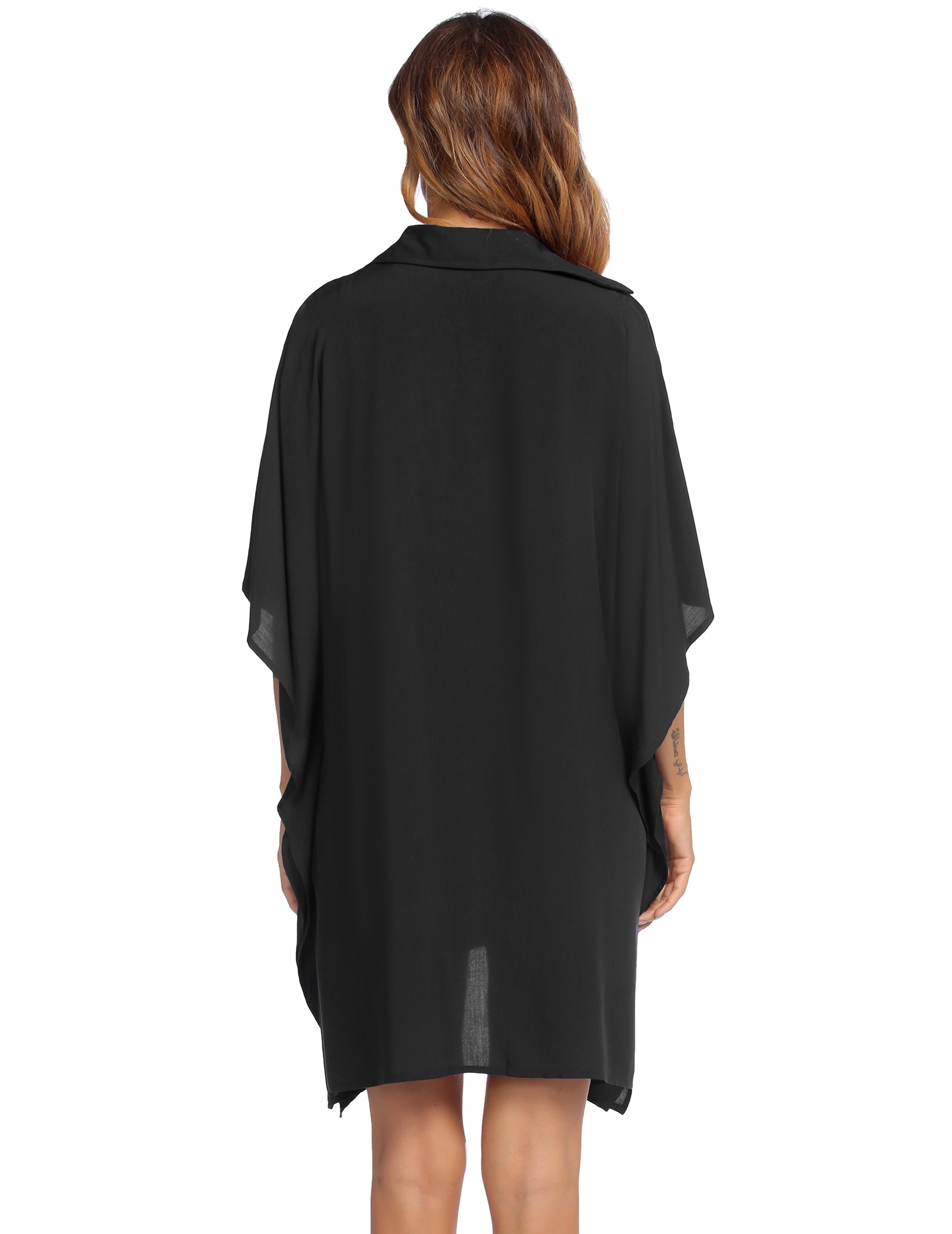 Back view of black swim cover-up with loose fit and button-up collar