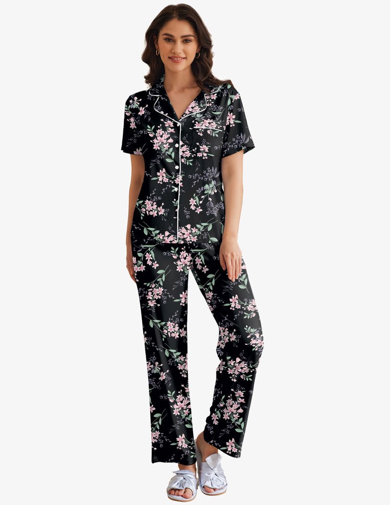 Pyjama set in black with pink floral print, short-sleeve button shirt and long pants
