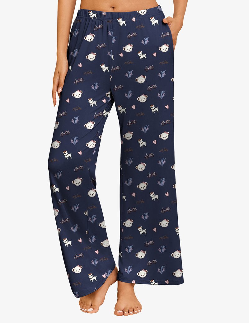 Navy Teddy Schlafhose: weites Bein, elastischer Bund, wiederholtes Tier- und Herzmuster