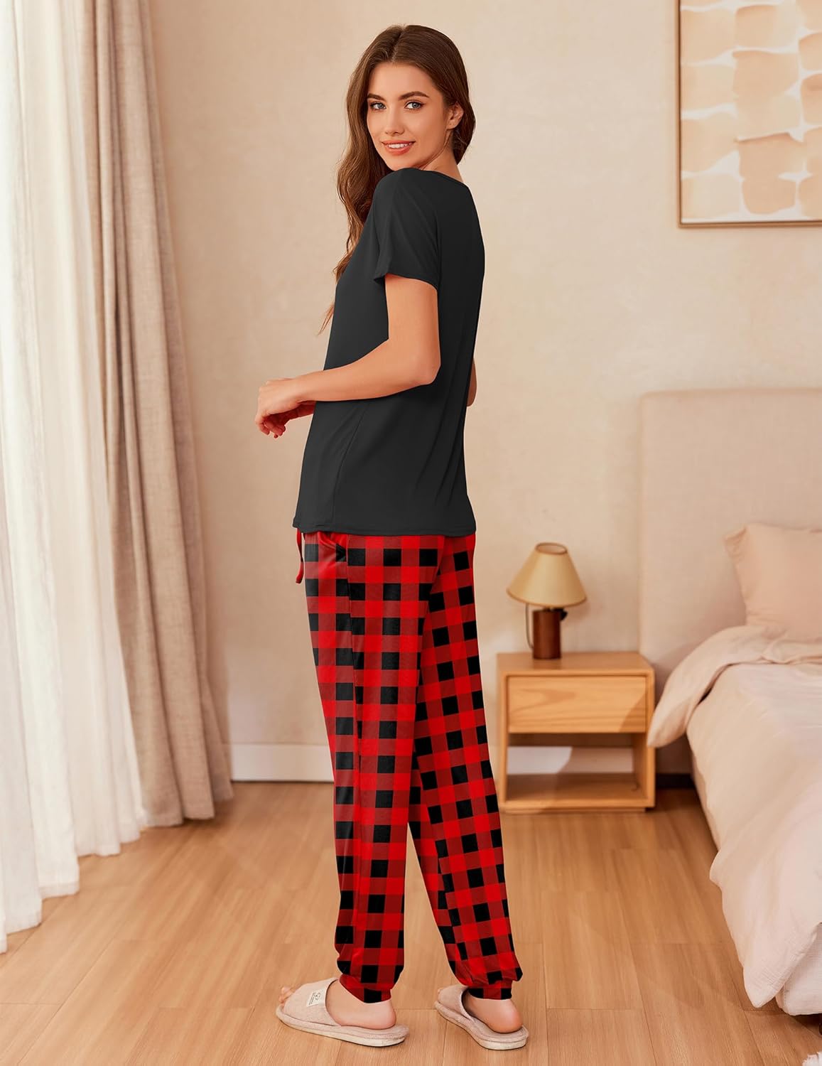 Black short-sleeve pajama shirt with red plaid long pants, relaxed lounge set