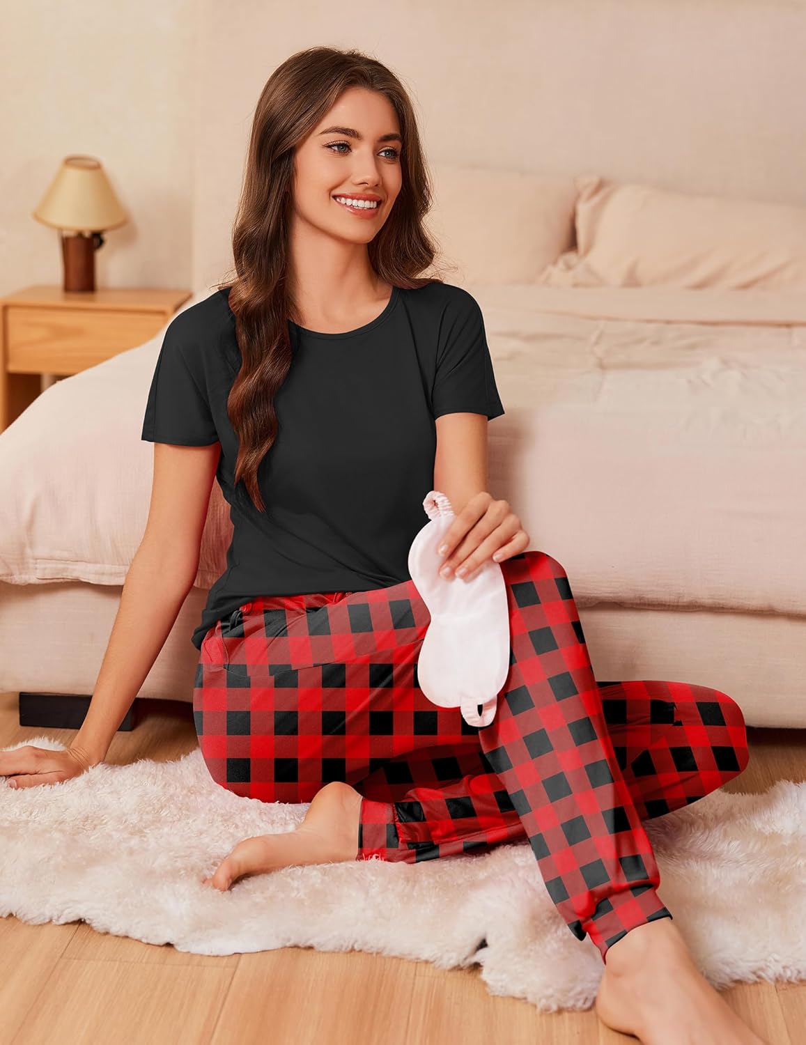 Black short-sleeve pajama top with red-and-black plaid pants and soft fabric sleep set