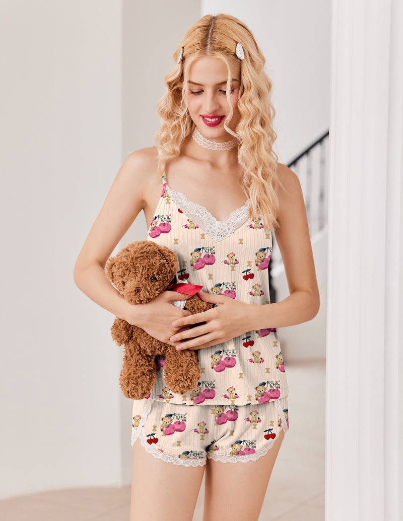 Cream teddy-printed cami pajama top and matching shorts with white lace trim.