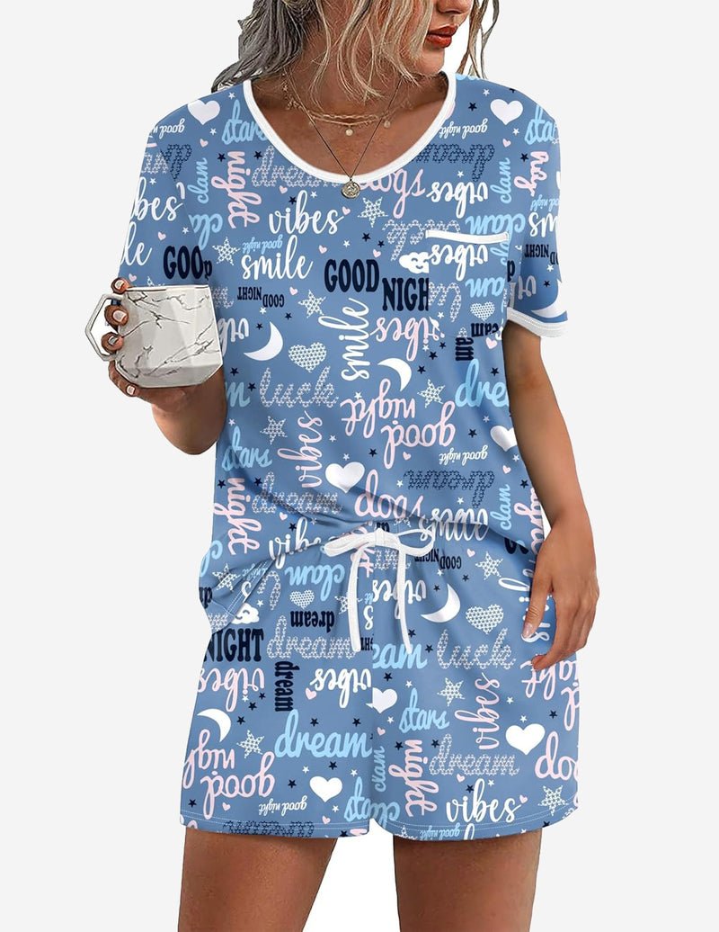 Blue pajama set with stars and message print, pocket tee and drawstring shorts
