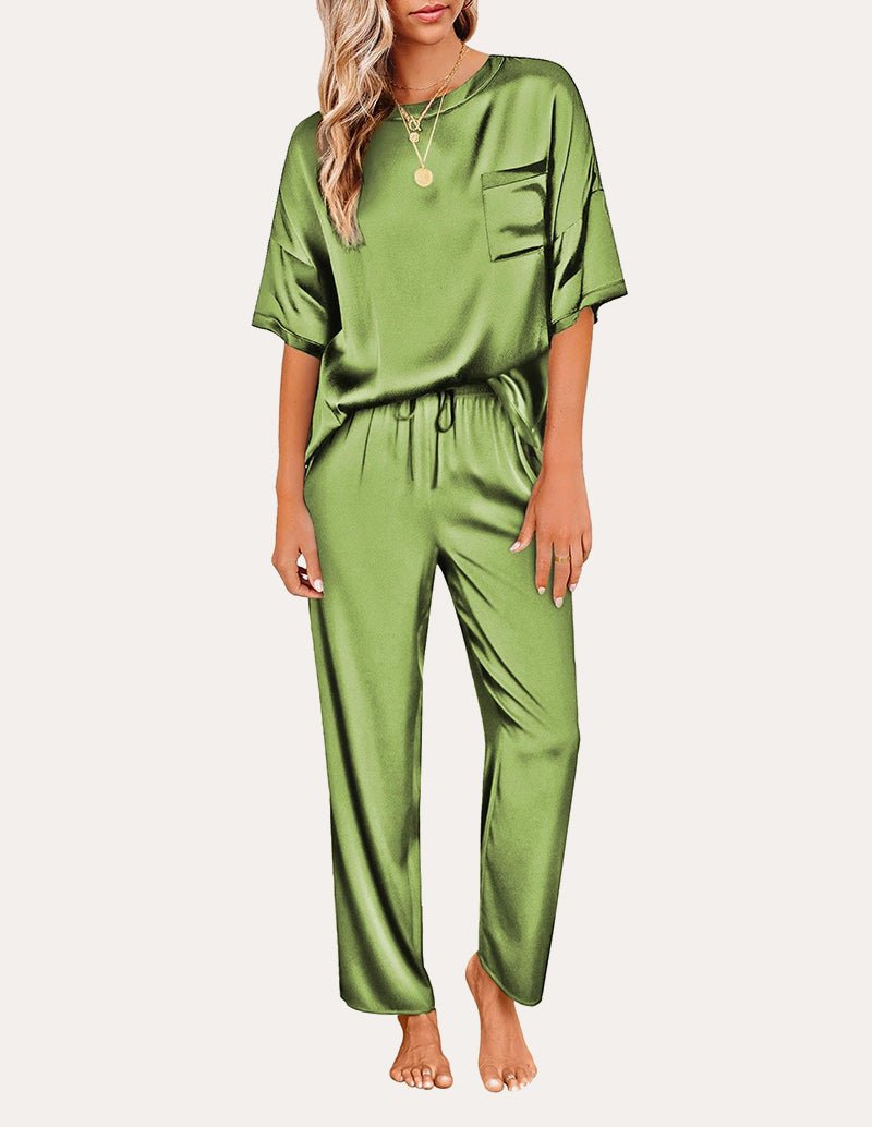Satin pajama set in green: short-sleeve top with chest pocket, drawstring waist pants.
