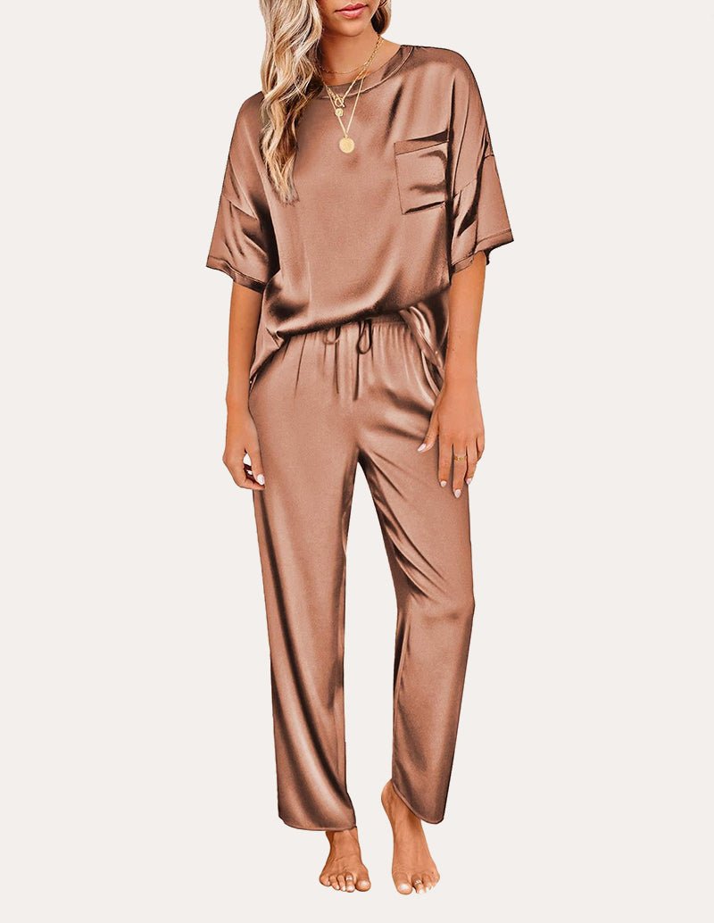 Champagne satin pajama set: short-sleeve top with chest pocket and drawstring waist pants.
