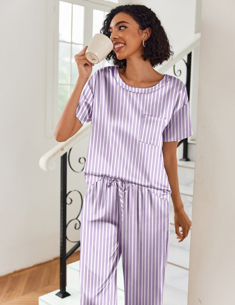 Purple striped satin pajama set with short sleeves, chest pocket, and wide-leg pants