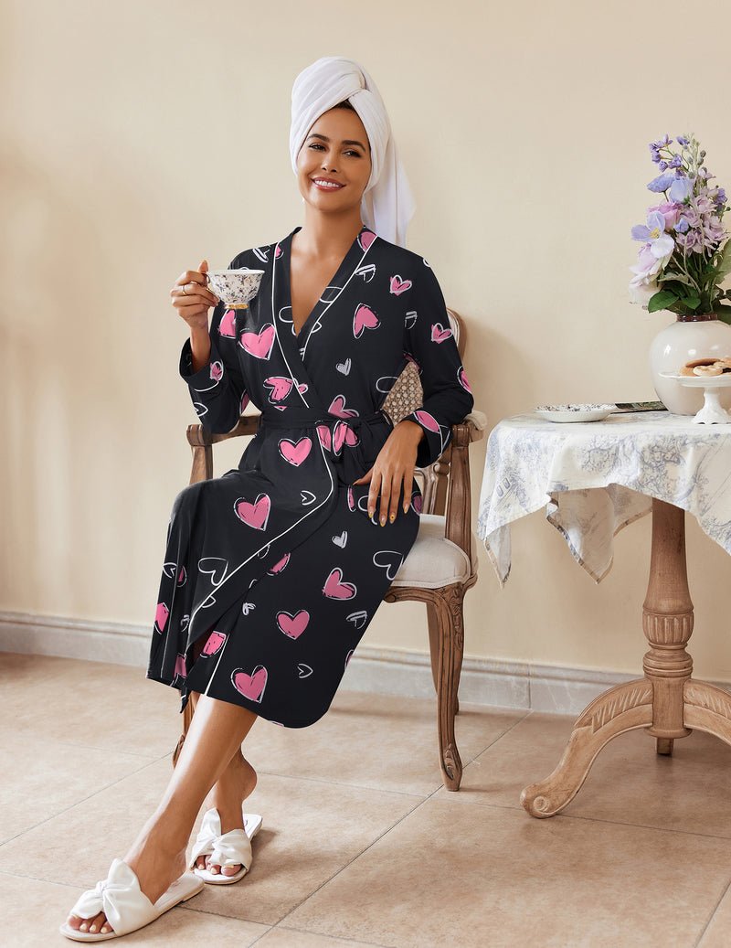 Pink heart print lightweight bathrobe, black fabric, front tie waist, long sleeves, shawl collar