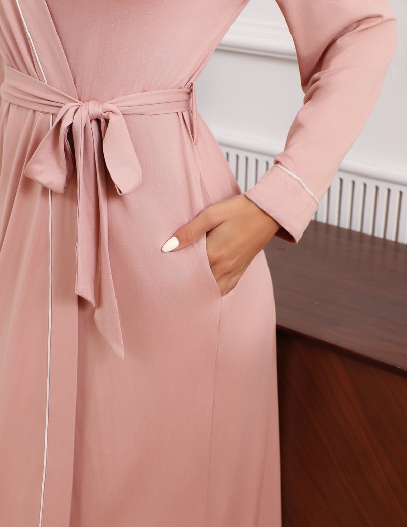 Misty rose robe detail: tied belt at waist with hanging ties, wide cuffs, front slit