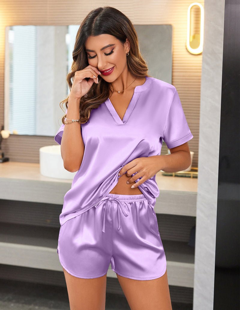 Lavender satin pajama set with V-neck top, short sleeves, and drawstring shorts