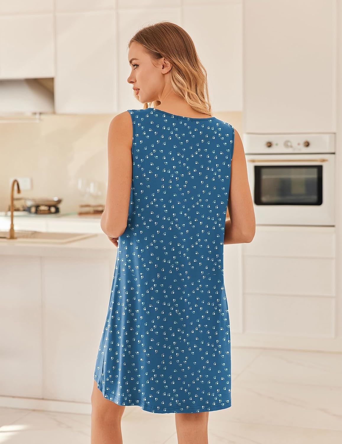 Blue sleeveless nightgown, small all-over floral print, shown from the back
