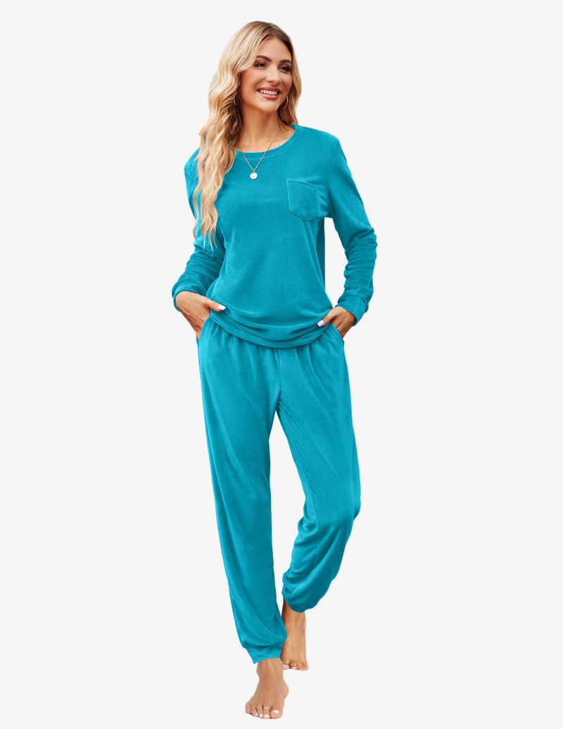 Lake Blue velour tracksuit set with long-sleeve top pocket and cuffed jogger pants.