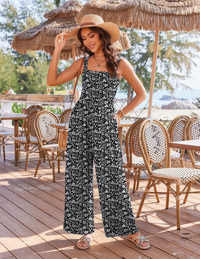 Black floral boho wide-leg jumpsuit with spaghetti straps and V-neck front
