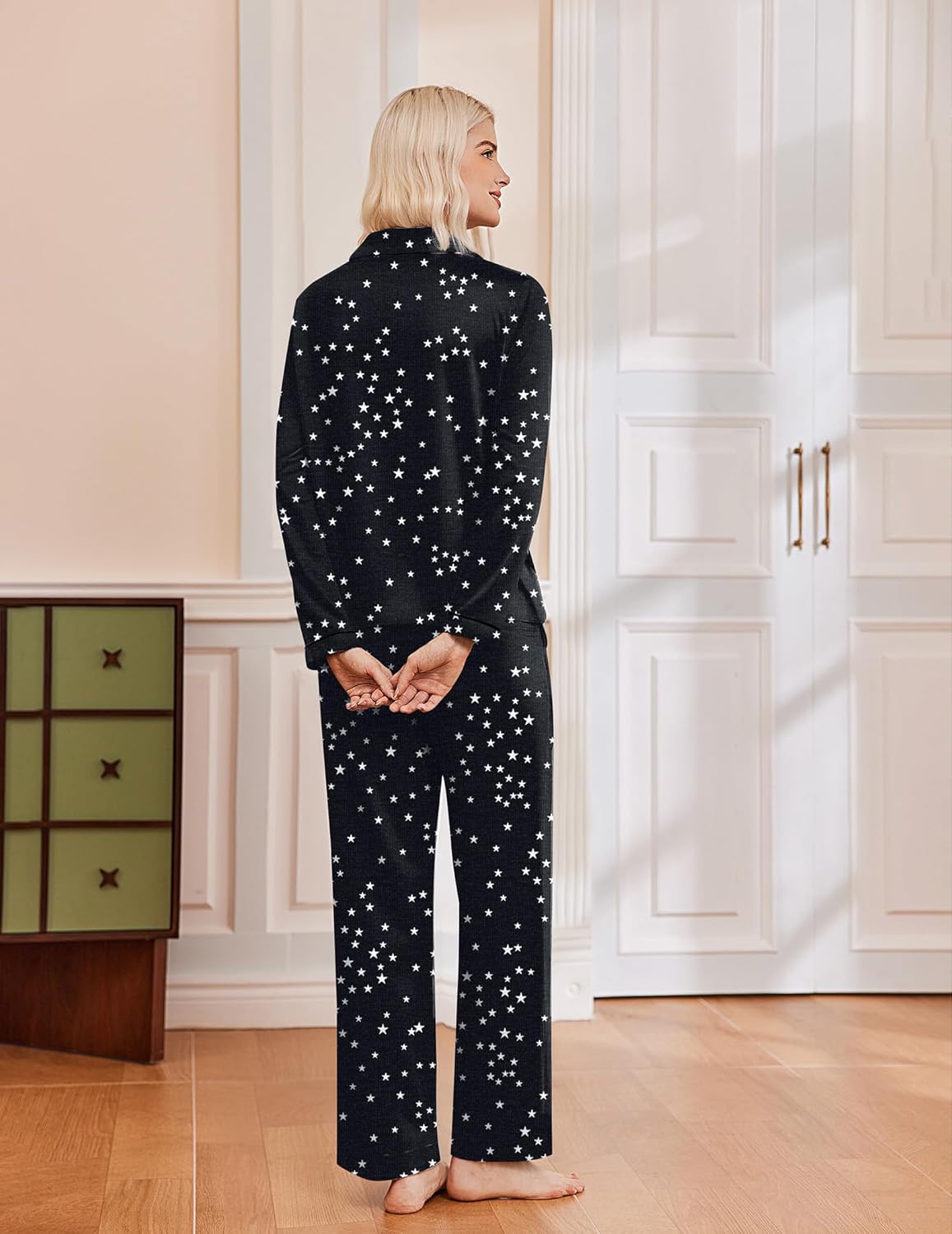 Black star-print pajama set, back view of long sleeves and wide-leg pants