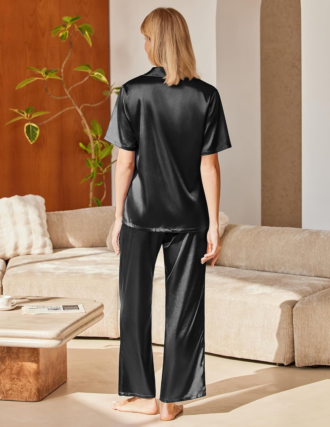 Women’s silk pajama set in black, short-sleeve top with long straight-leg pants, back view