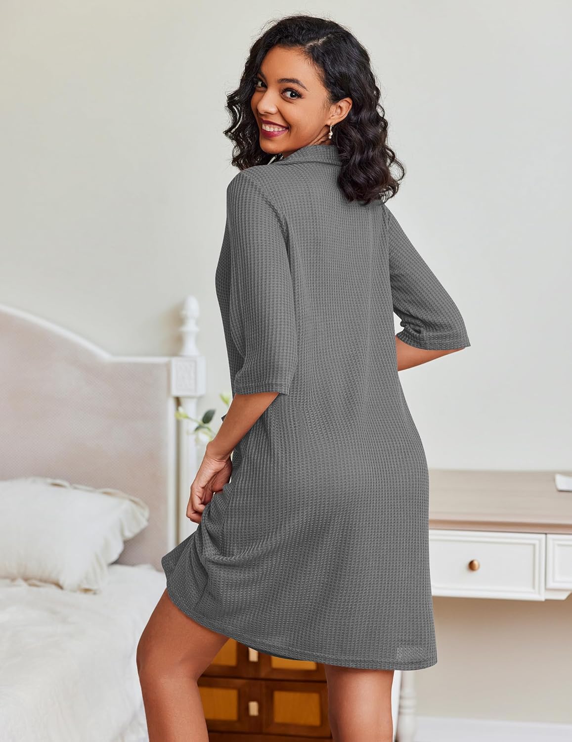 Light gray waffle-knit zip bathrobe with hood and side pockets, relaxed fit