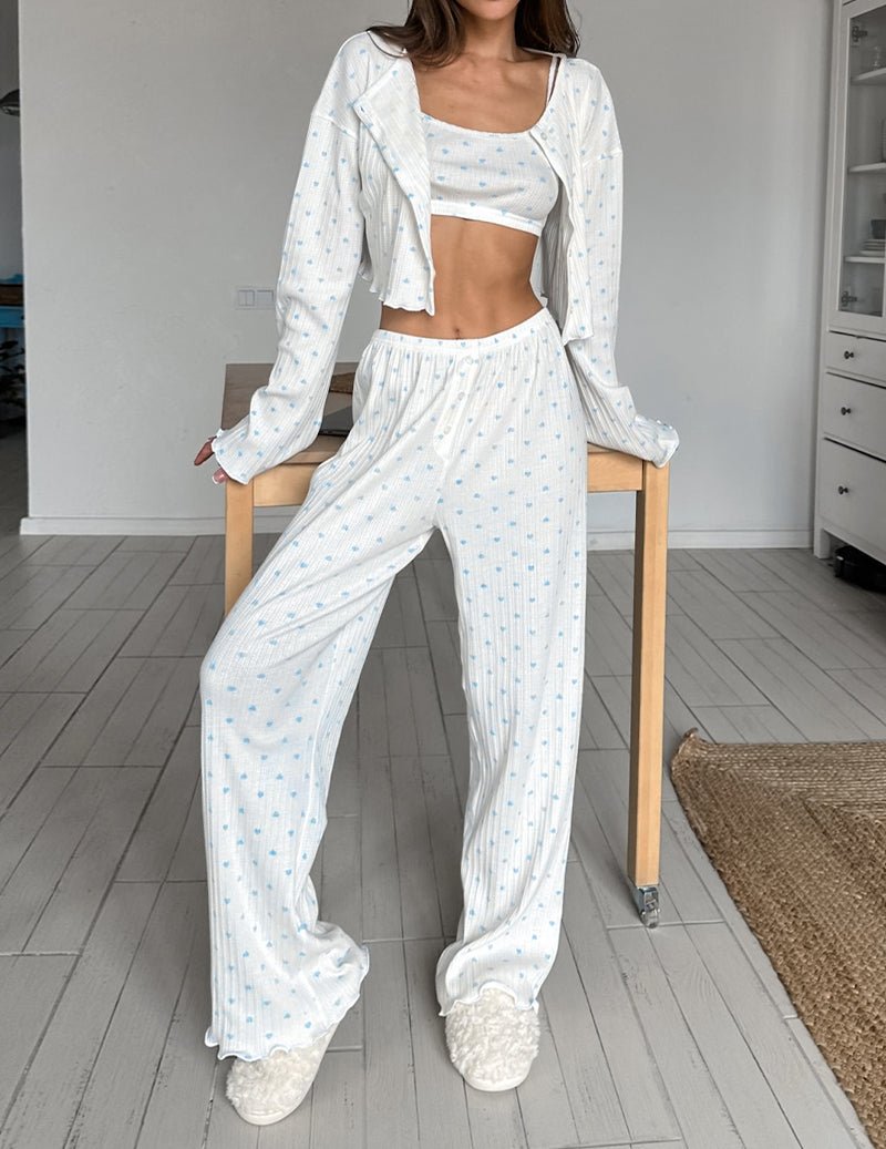 White long-sleeve cardigan with blue dots and matching ribbed lounge pants
