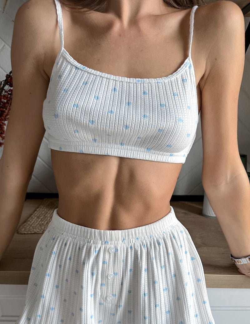 White ribbed crop bralette with blue dot print and spaghetti straps