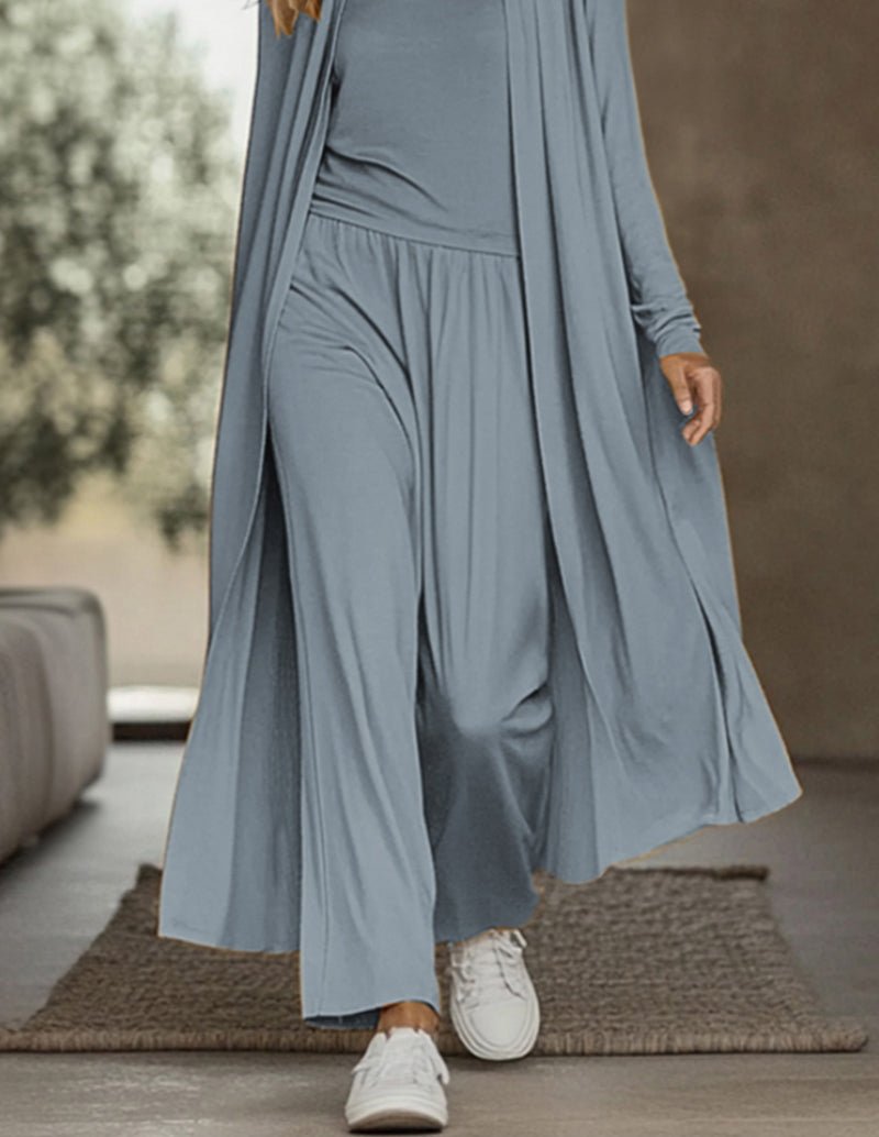 Blue turtleneck lounge dress with flowing skirt and matching loose pants