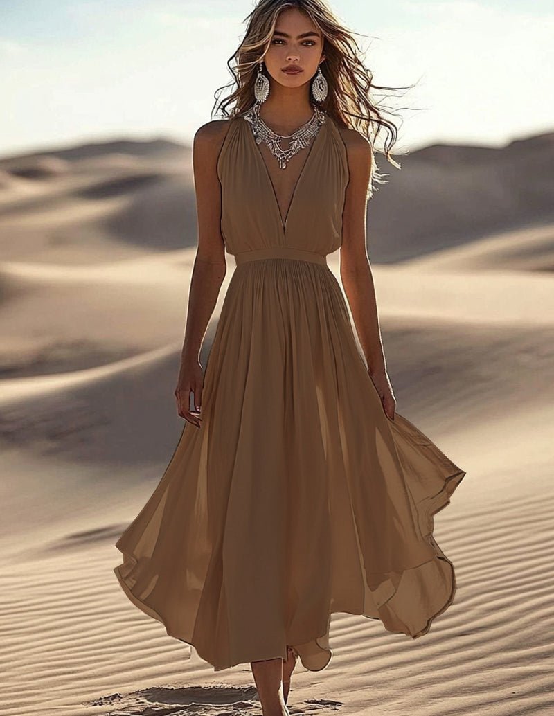 Khaki sleeveless deep V-neck midi dress with gathered waist and flowing layered skirt.
