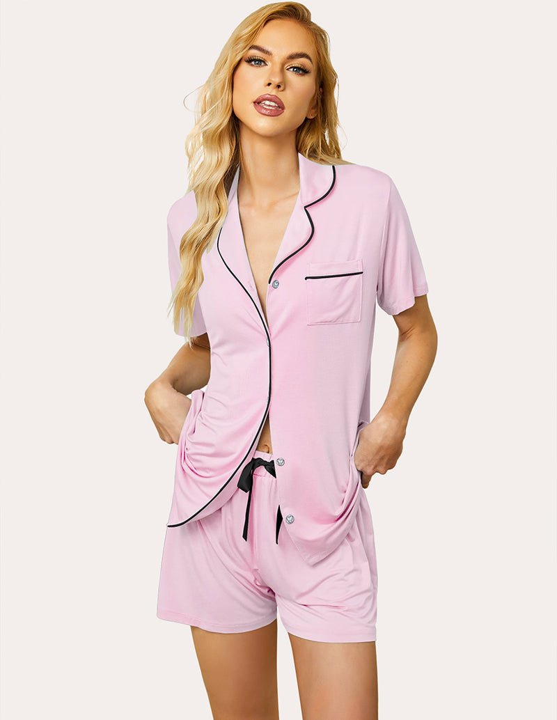 Pink pajama set with short-sleeve button shirt and drawstring shorts, contrast trim
