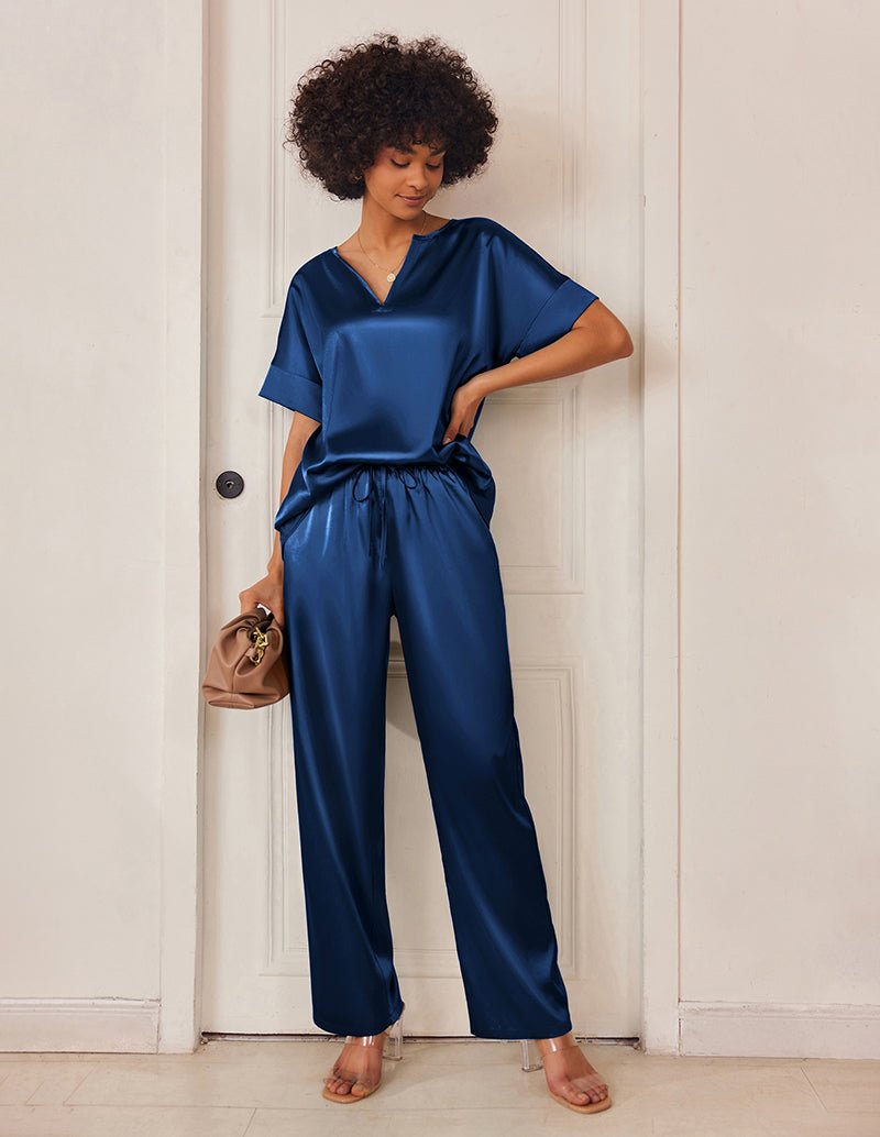 Blue satin V-neck pajama set with short sleeves and drawstring wide-leg pants