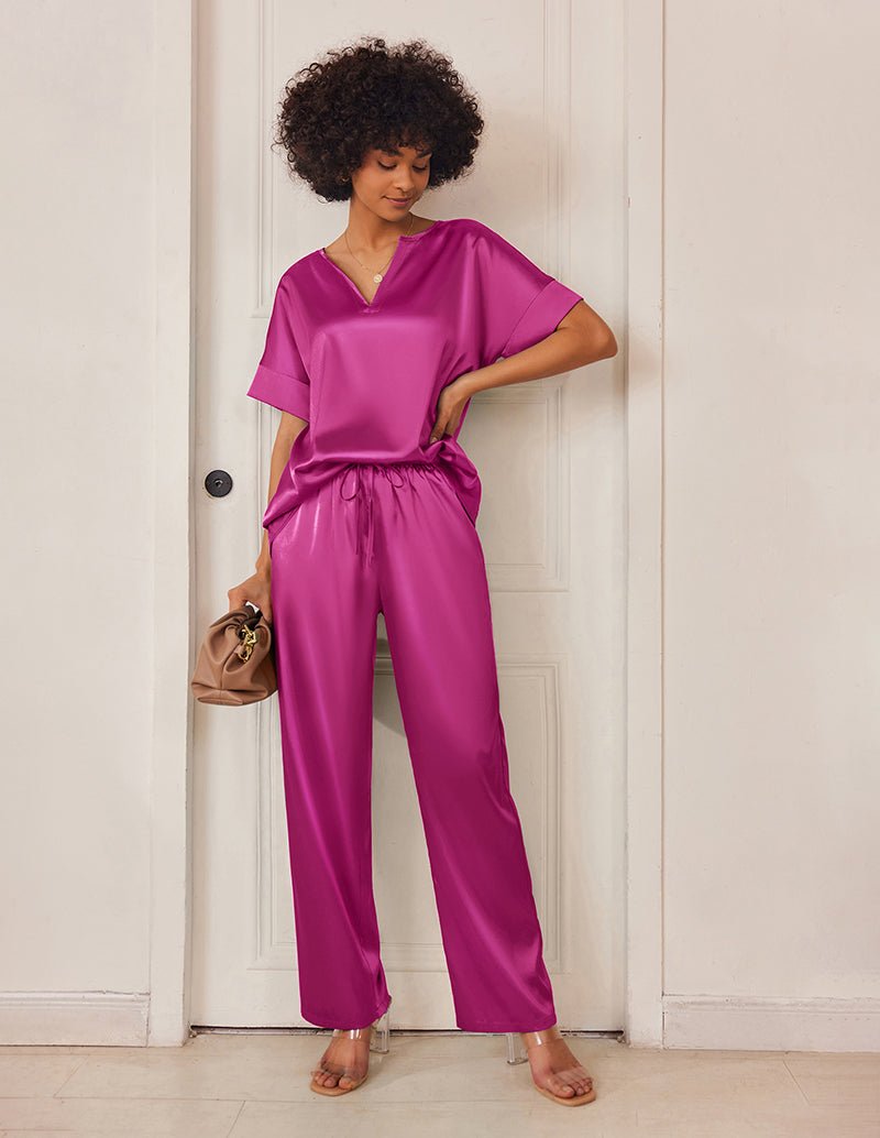 Purple satin V-neck pajama set with short sleeves and drawstring wide-leg pants