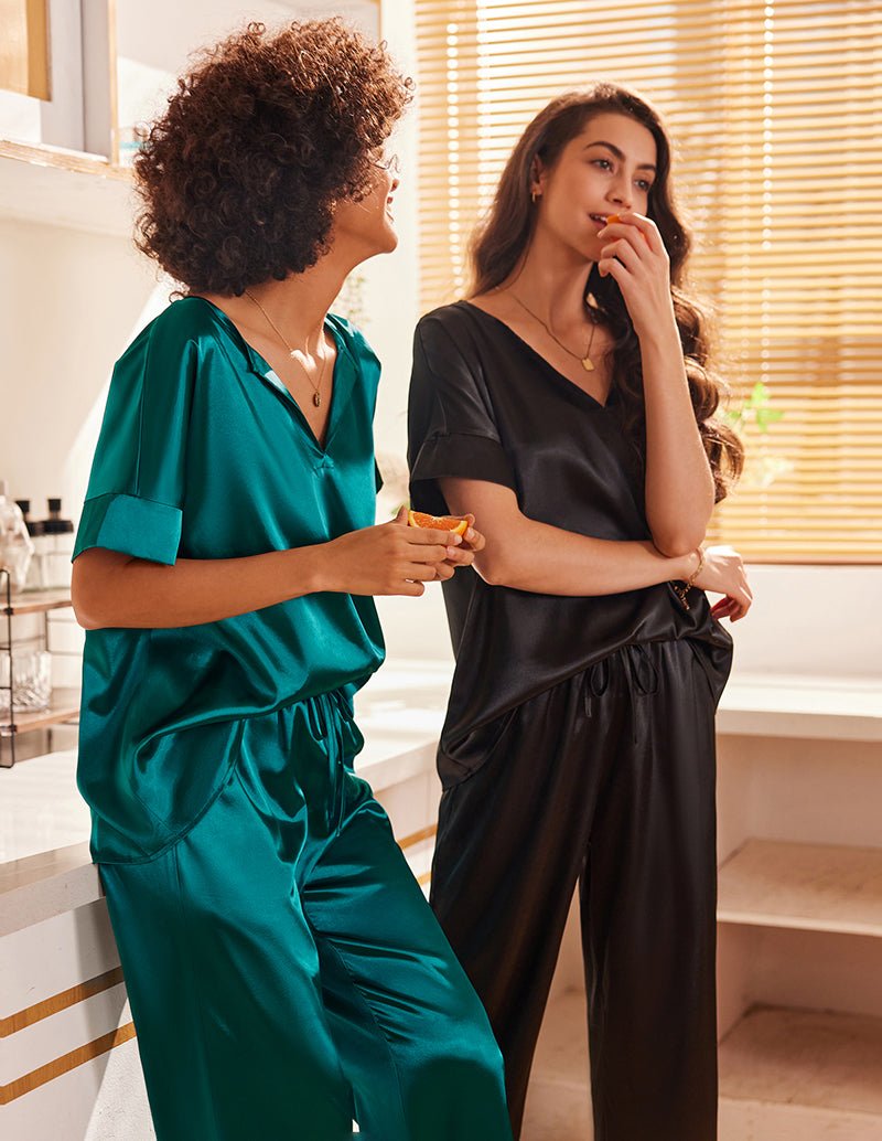 Teal satin V-neck pajama set with short sleeves and drawstring wide-leg pants