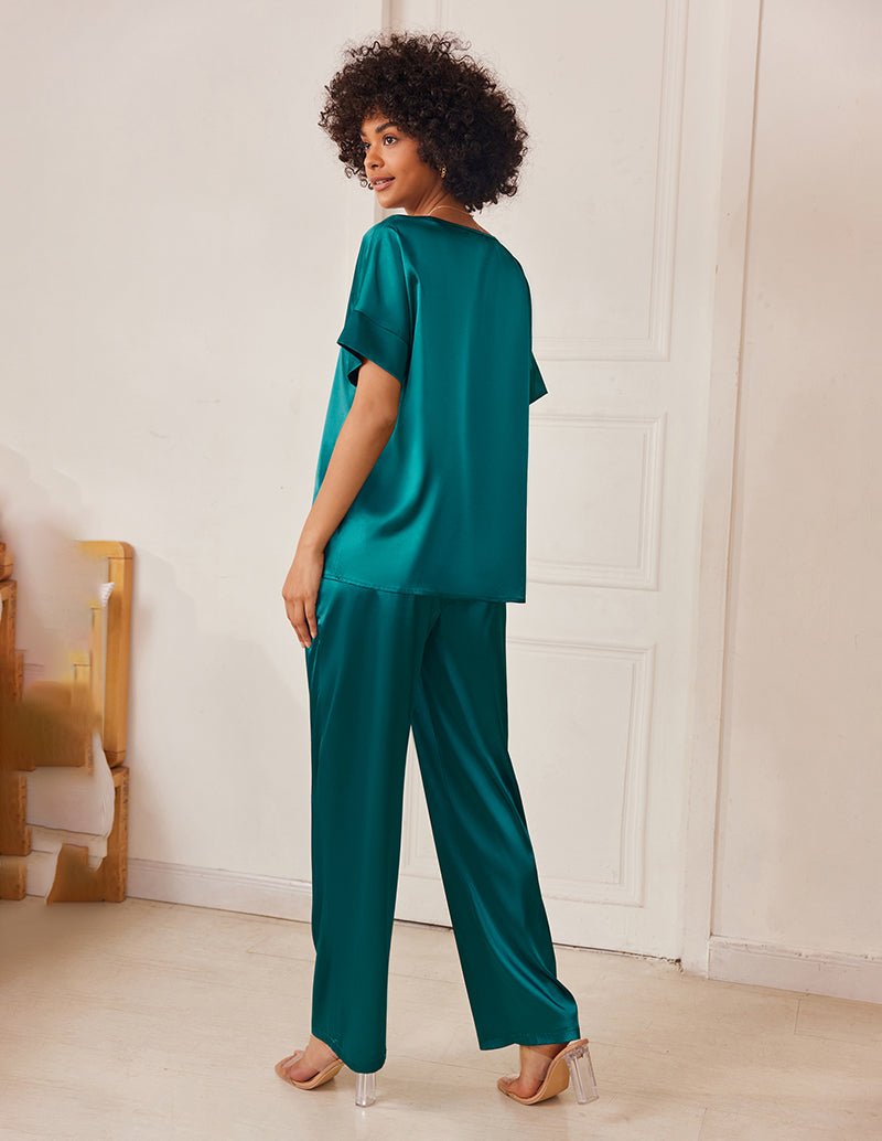 Green satin V-neck pajama set with short-sleeve top and drawstring wide-leg pants