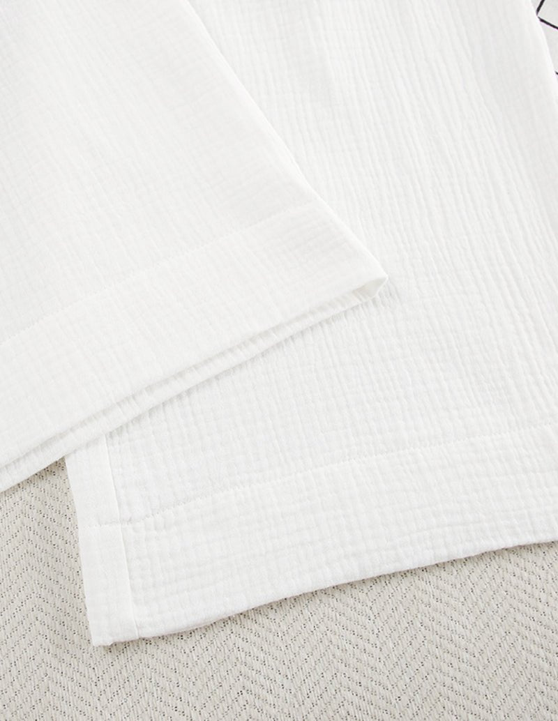 White cotton lounge set sleeve and hem seam detail