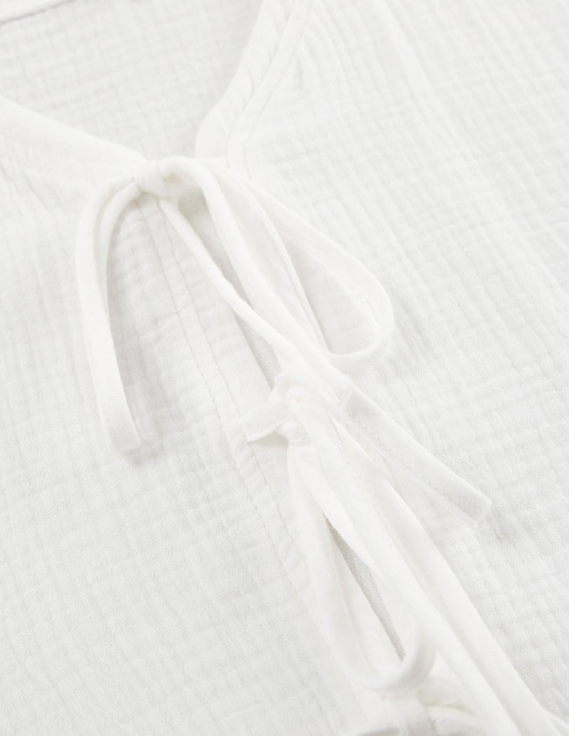 White cotton lounge top with gathered neckline and tie drawstring