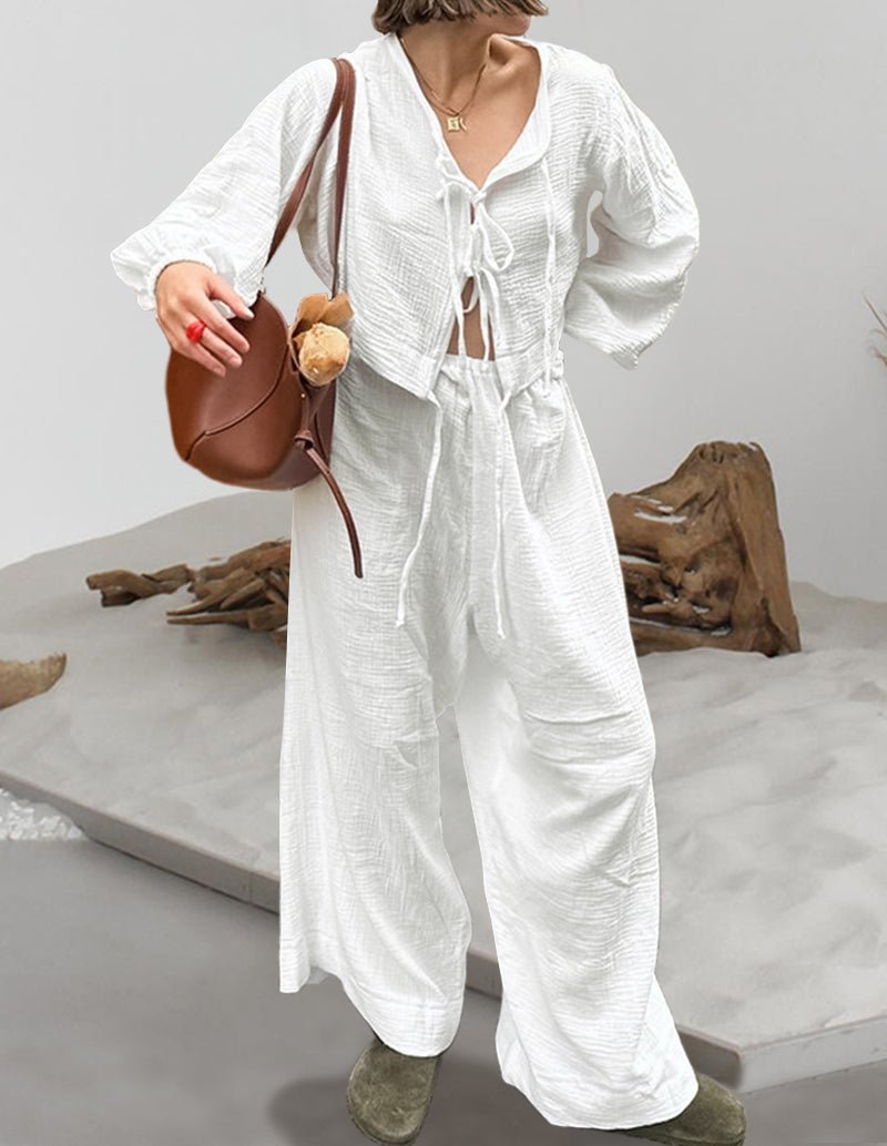 White cotton lounge set with drawstring V-neck top and wide-leg pants