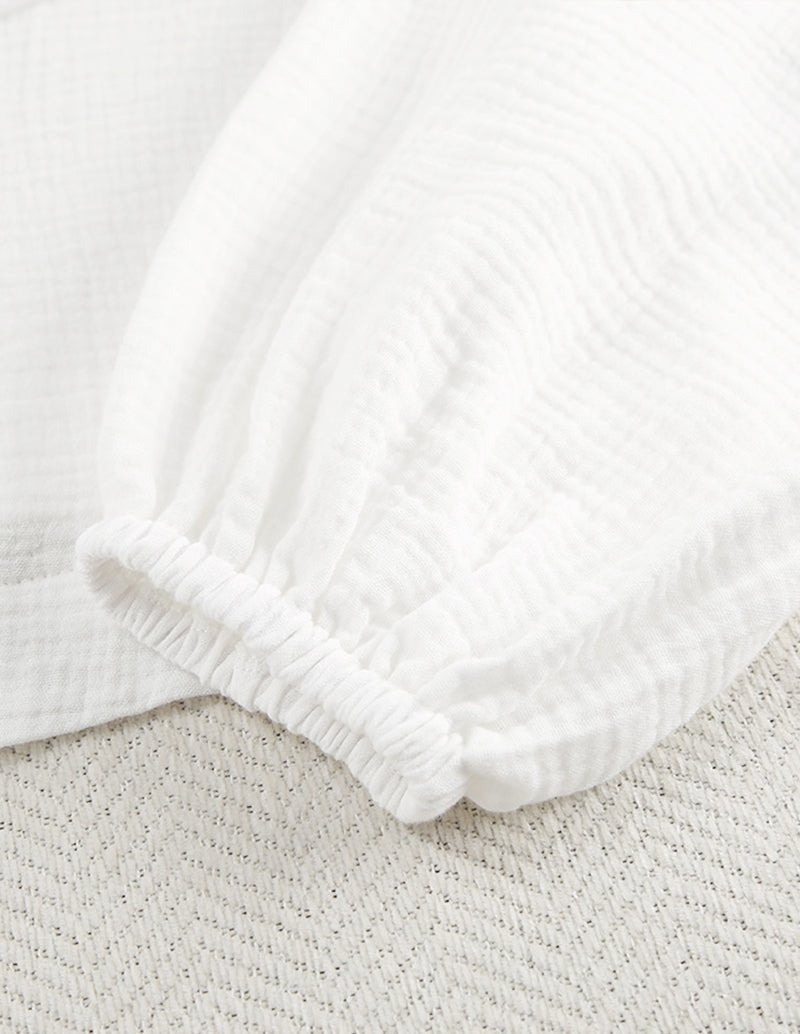 White cotton lounge pants cuff with elastic hem and soft texture