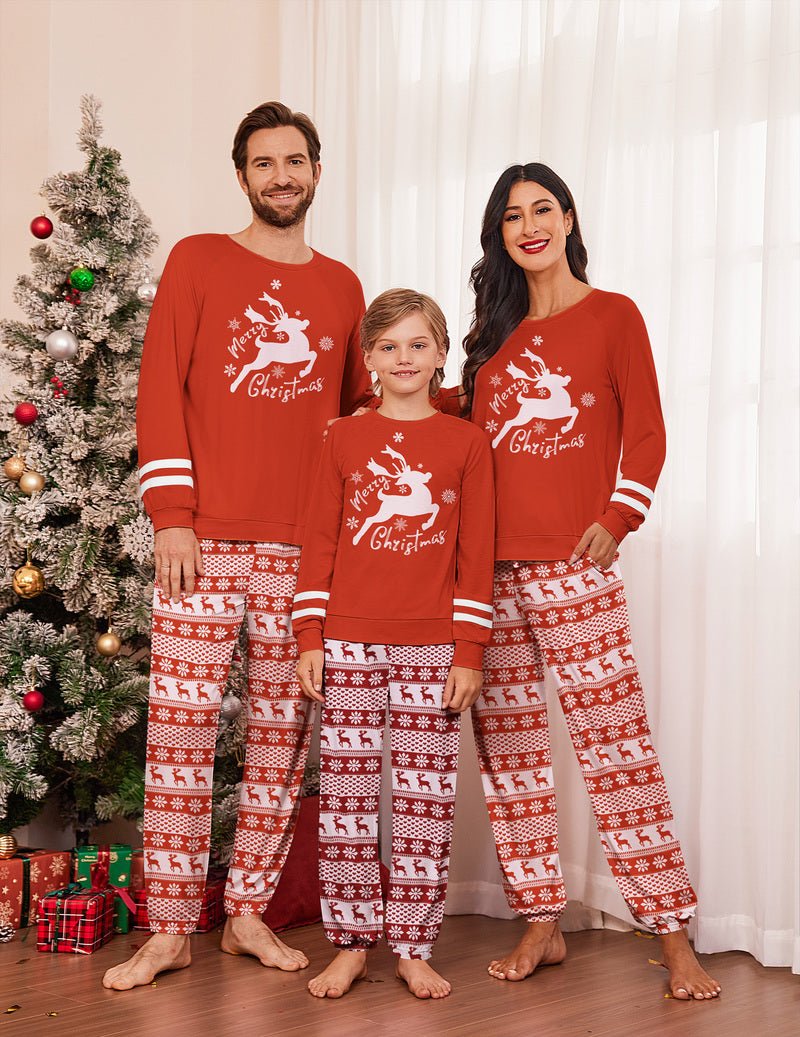 Family matching Christmas pajama set in red with reindeer graphic and patterned cuffs