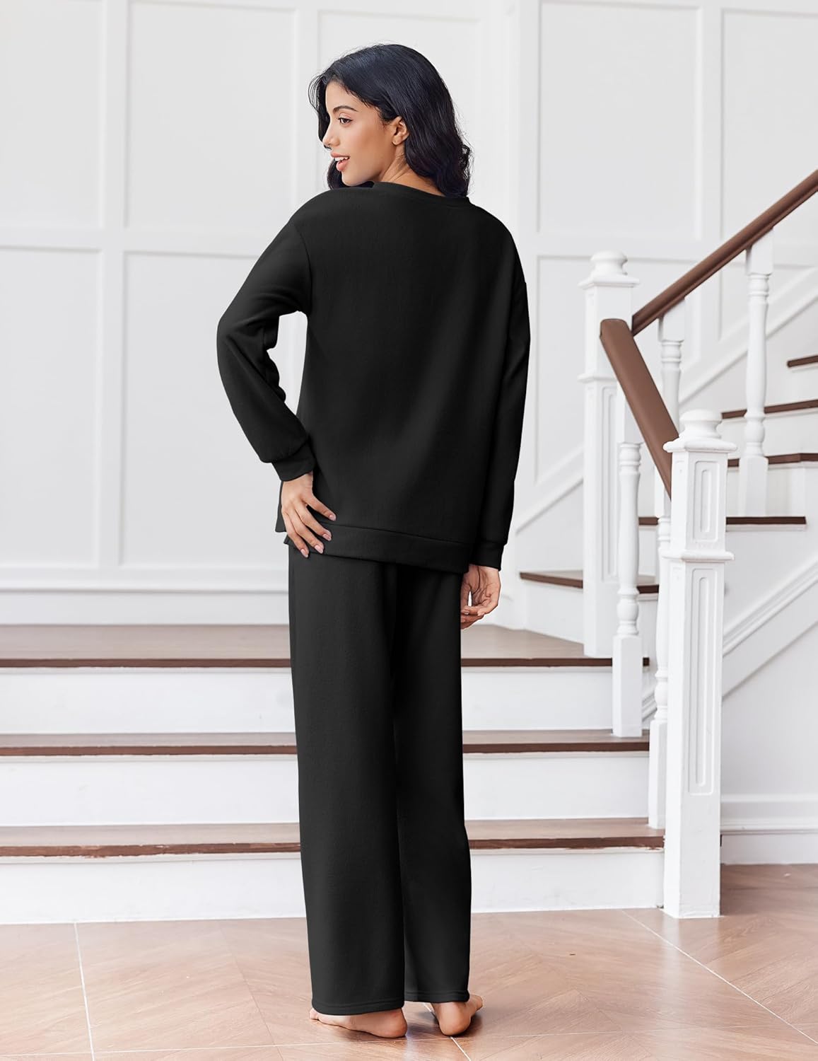 Black fleece long-sleeve lounge set with matching straight-leg pants, back view