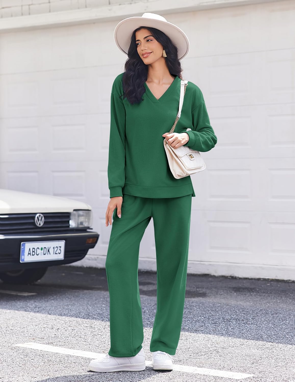 Green fleece long-sleeve lounge set with V-neck top and matching wide-leg pants, front view