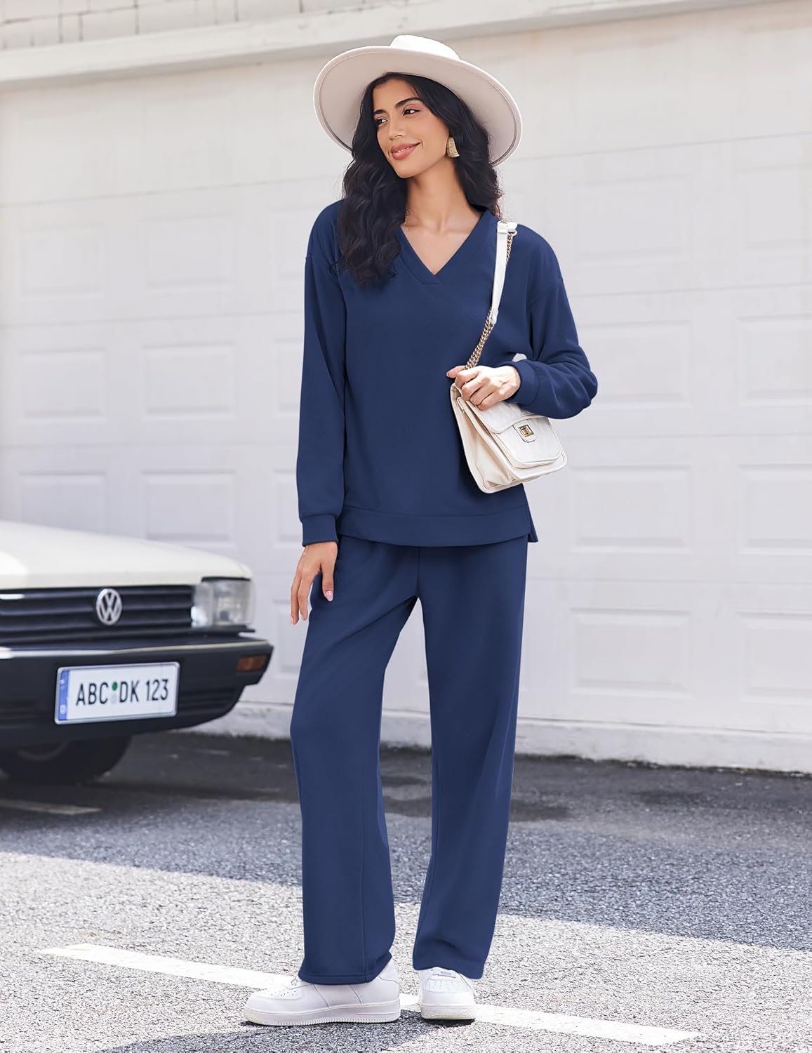 Navy fleece long-sleeve lounge set with V-neck top and matching wide-leg pants, front view