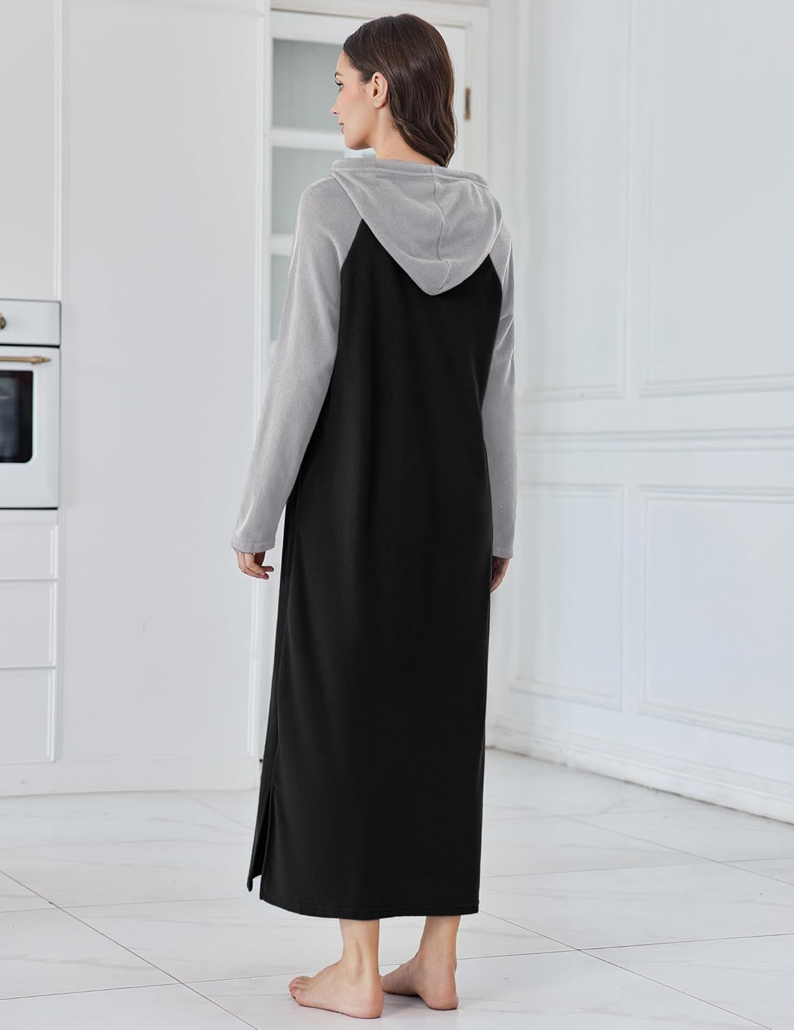 Back view of fleece hooded long night gown: black body with gray hood and sleeves