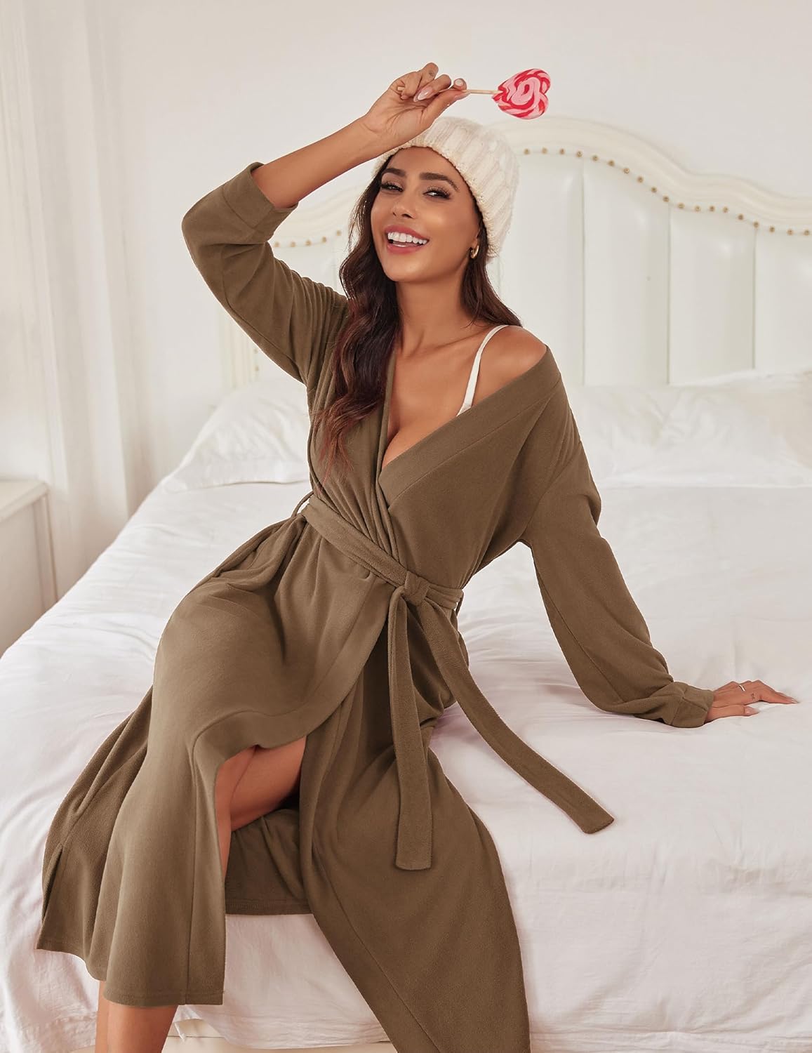 Brown-lapel plush bathrobe with tied belt, long sleeves, and open V-neck front