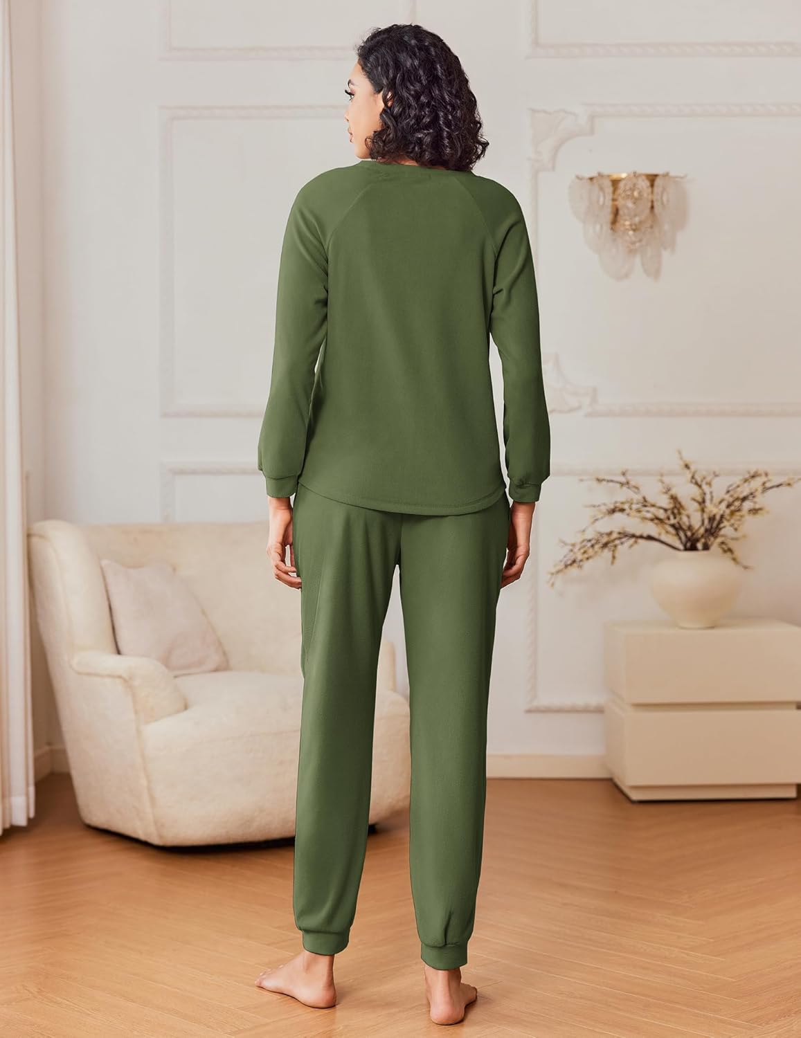 Green pajama set, back view: long-sleeve top with matching cuffed jogger pants