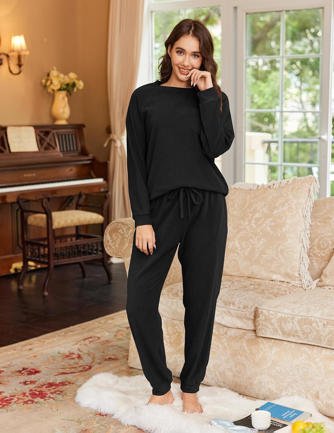 Black fuzzy fleece pajama set, long sleeves and relaxed drawstring joggers, front view