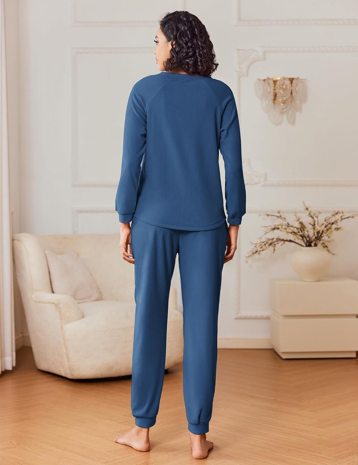 Navy blue fuzzy fleece pajama set, long sleeves and jogger pants, back view
