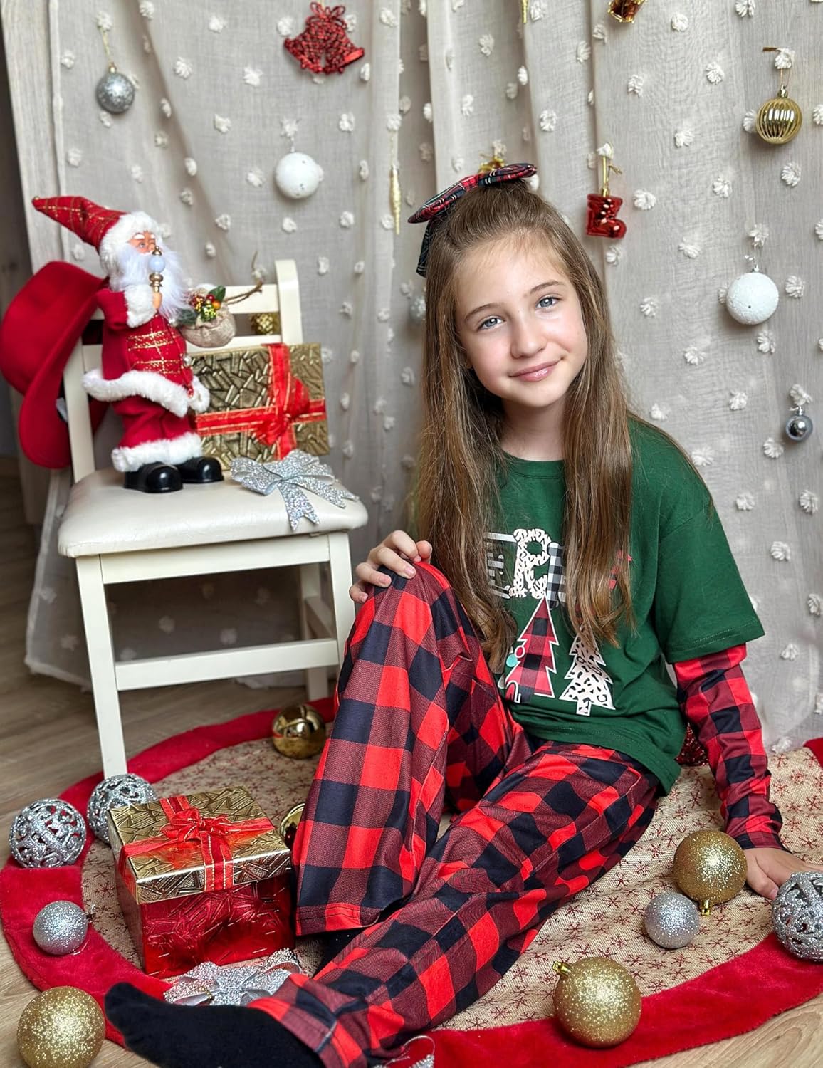 Red plaid pajama bottoms with elastic waistband and relaxed straight legs