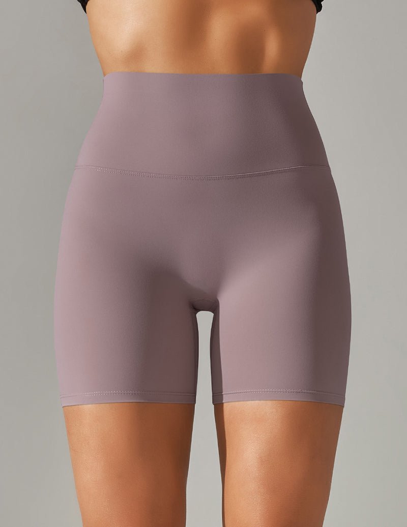 Light purple high-waist stretch yoga shorts with smooth front panel