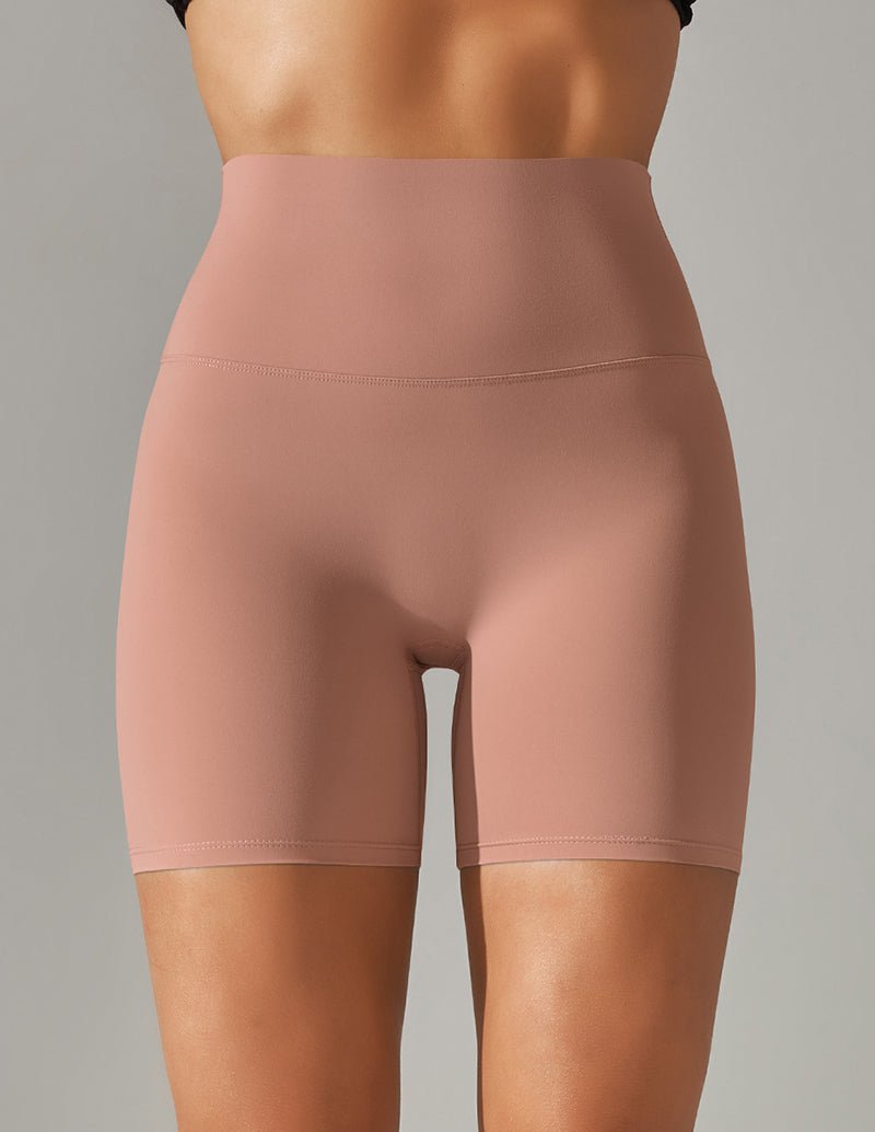 Rose pink high-waist stretch yoga shorts with smooth front panel
