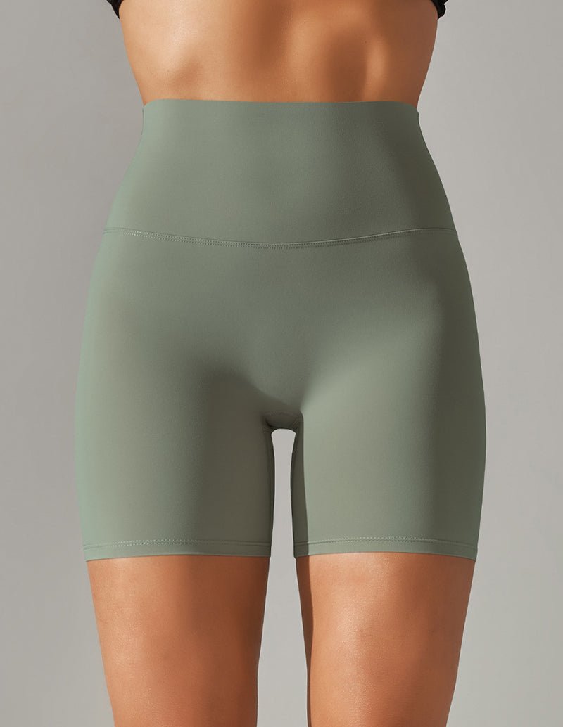 High-waisted yoga shorts, olive green stretch fabric