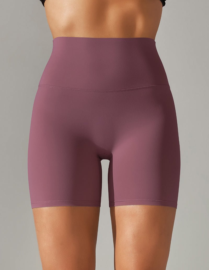 High-waisted yoga shorts, dusty purple stretch fabric