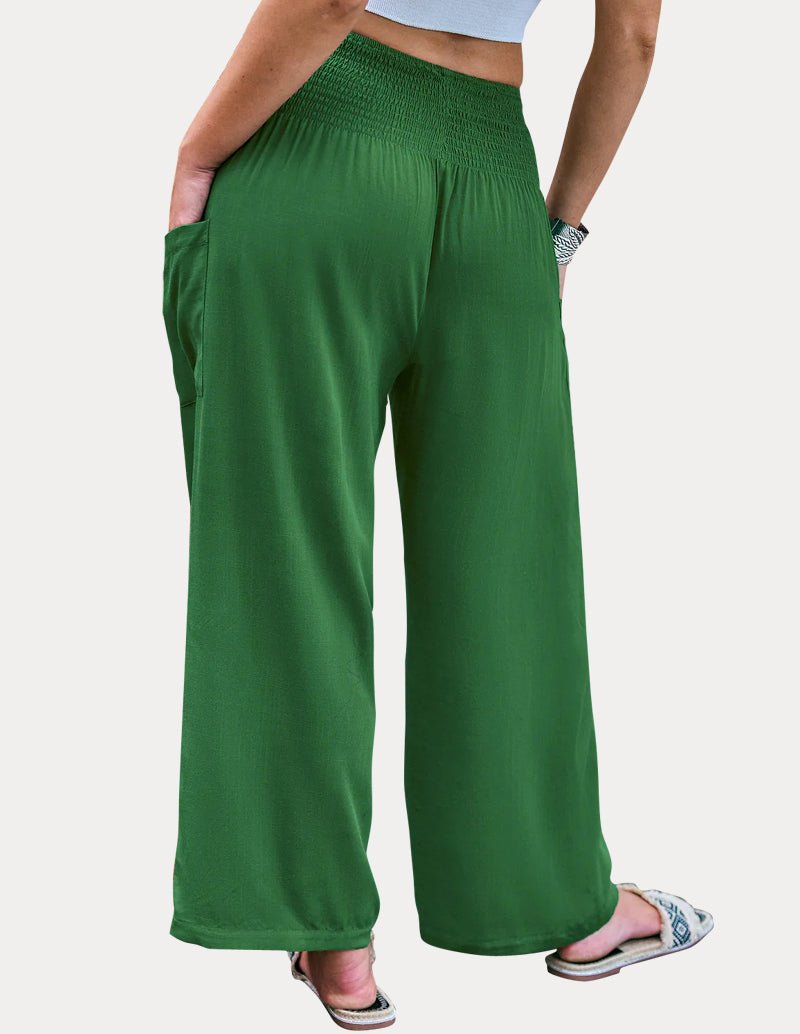 Green high-waisted wide-leg lounge pants with smocked waistband and relaxed legs