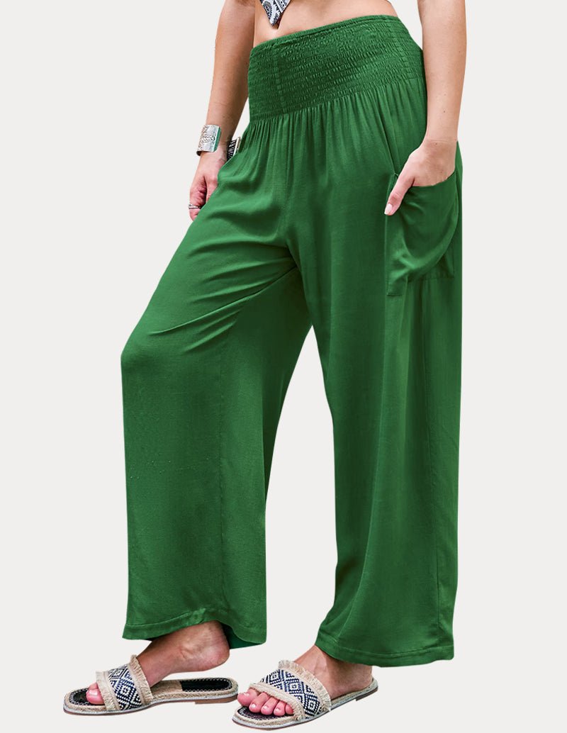 Green high-waisted wide-leg lounge pants with smocked waistband and side pockets