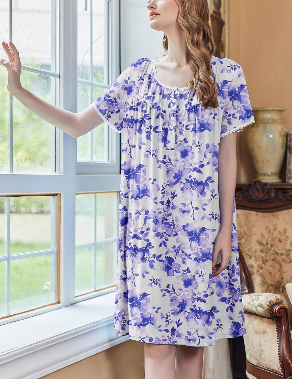 Purple floral house dress with short sleeves, scoop neck, and white button front