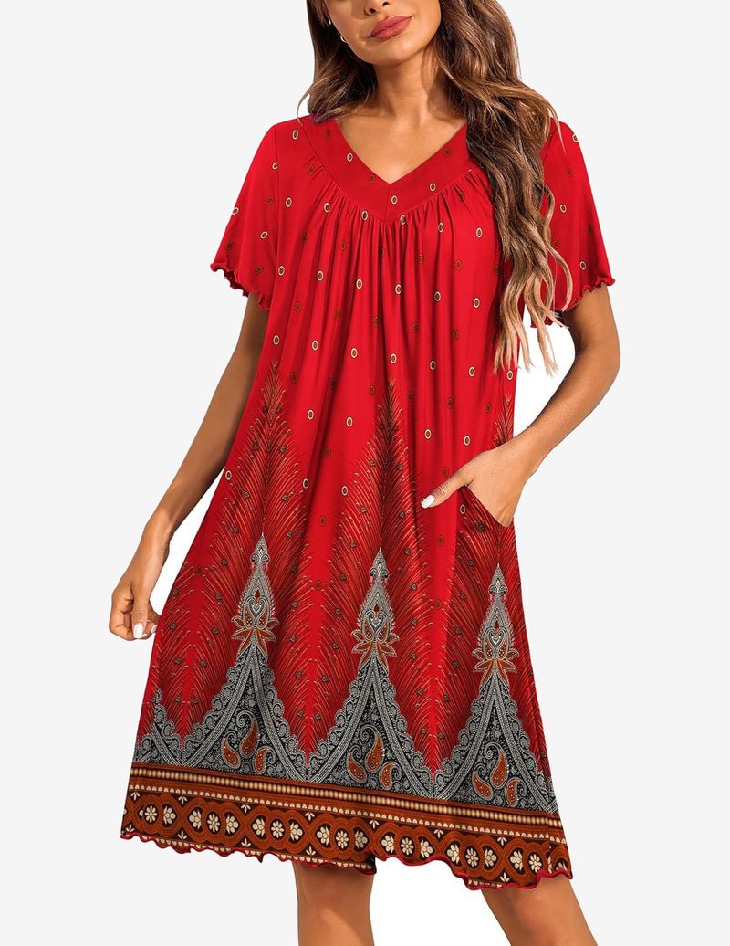 Red V-neck house dress with gathered yoke and short flutter sleeves, ornate border hem